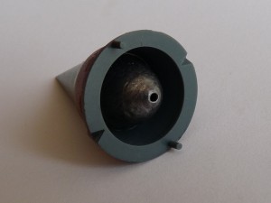 A 15-gram lead fishing weight glued in the nosecone A 15-gram lead fishing weight glued in the nosecone